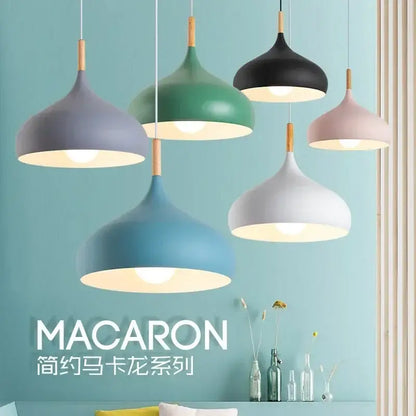 Modern blue stainless steel pendant light with pastel macaron shades matte metal finish and wooden stem for bedroom use