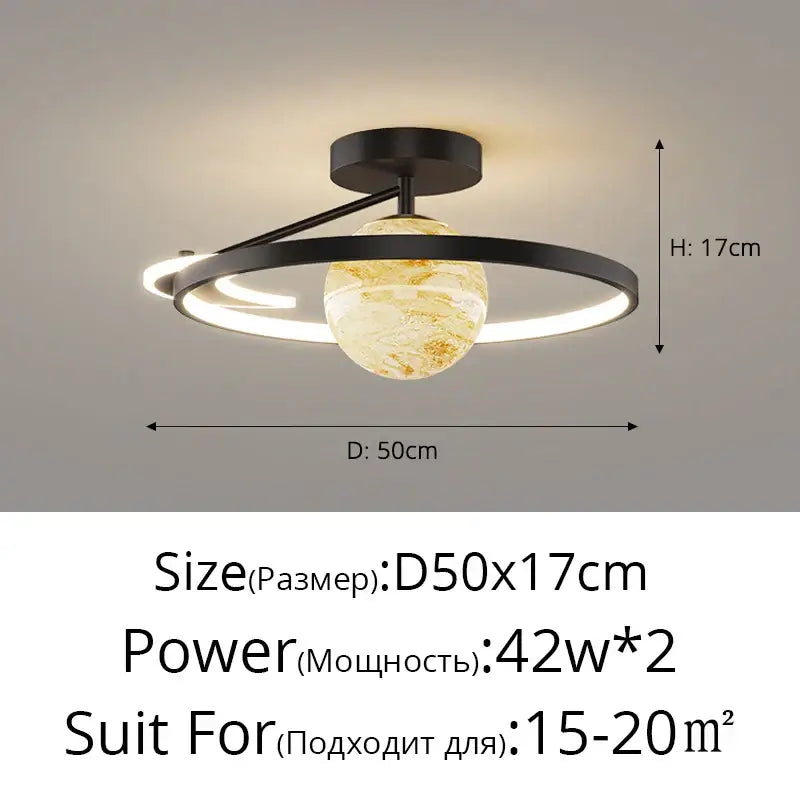 Modern black metal pendant light with amber gold globe and glowing rings for bedroom decorbites blue star led fixture
