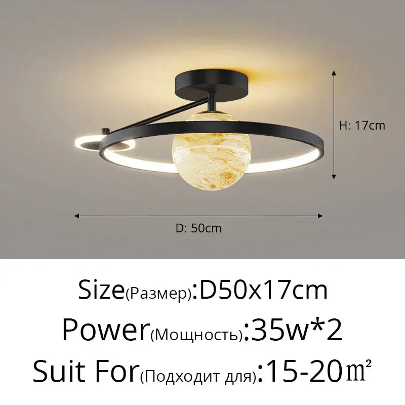 Modern black metal pendant light with marbled amber glass globe and circular led rings decorbites blue star led fixture