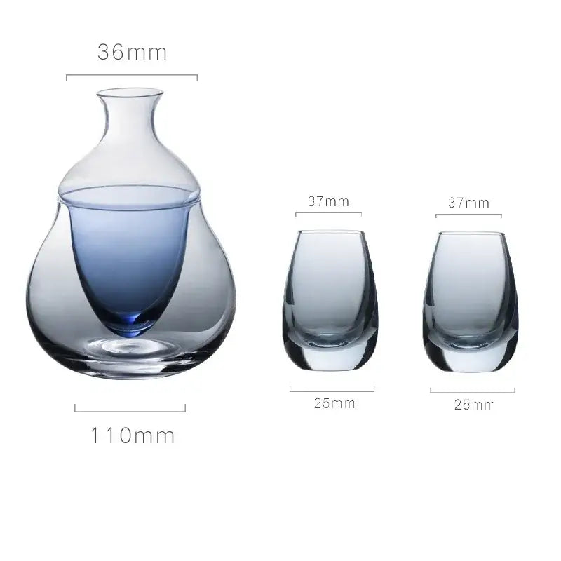 Elegant glass wine pot ice jug with gradient blue interior and clear exterior, paired with two matching tumblers