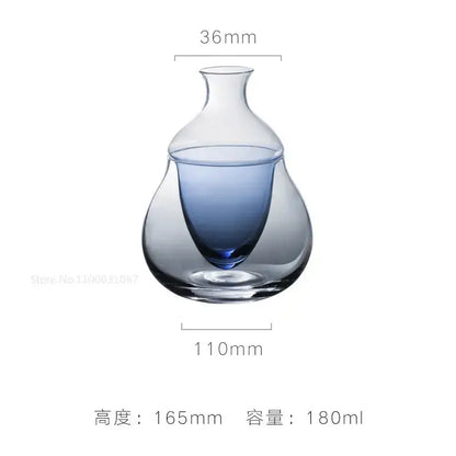 A sleek transparent glass wine pot with gradient blue interior and narrow neck, ideal as a modern pot ice jug