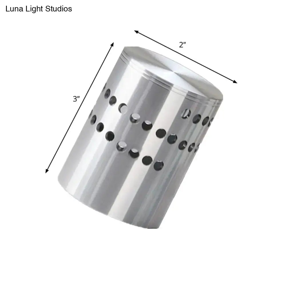 Silver cylindrical metal modern blue whirling wall light with circular perforations for 220v-240v and 110v-120v use