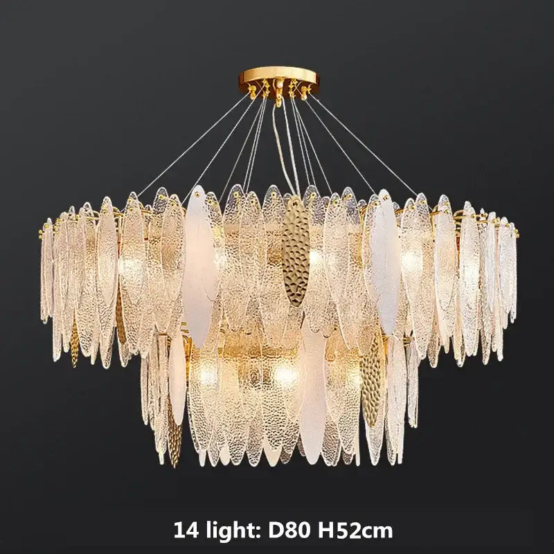 Gold-toned pendant lights with layered textured glass leaf-shaped shades featuring decorbites gold metal chain