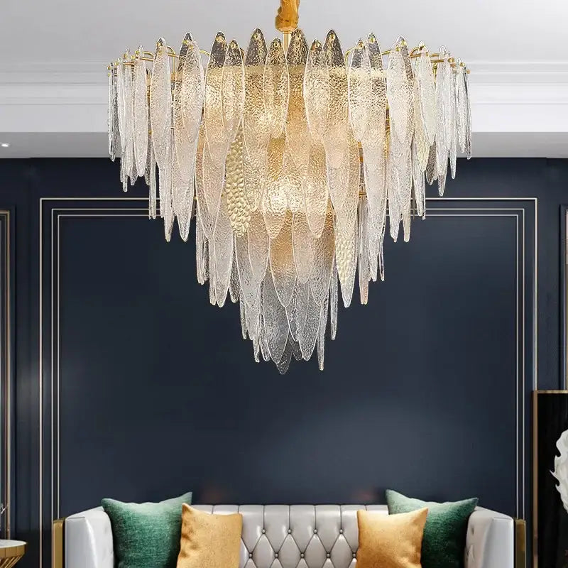Elegant gold-toned pendant lights with cascading textured glass leaf shades and decorbites gold metal chain for living room decor