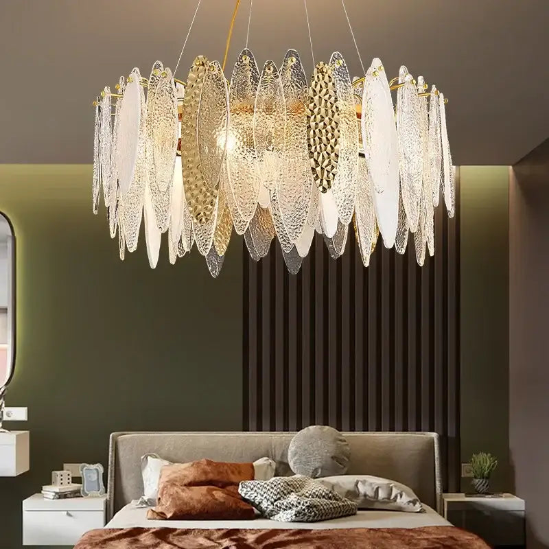 Modern blue and white leaf pendant lights with gold-toned glass shades and decorbites gold metal chain for living room decor