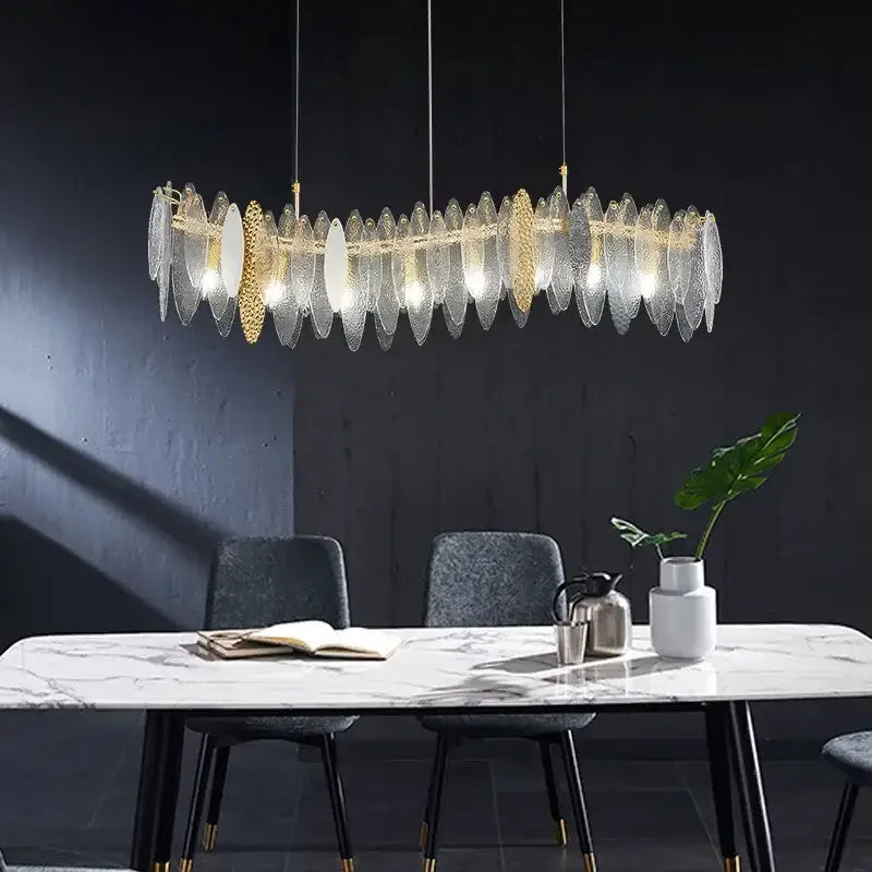 Modern blue and white leaf pendant lights with gold metal chain featuring gold and clear glass leaf-shaped fixture decorbites gold metal