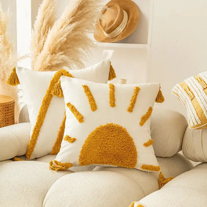 White cushion cover with mustard yellow sun design and tassels for modern boho decorbites golden yellow geometric decor