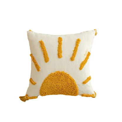 Cream-colored cushion cover with textured mustard-yellow sun design tassel trim for modern boho decorbites golden yellow decor