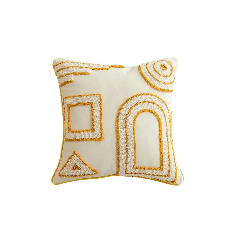 Cream-colored cushion cover with mustard yellow geometric tufted tassel embroidery for modern boho decorbites