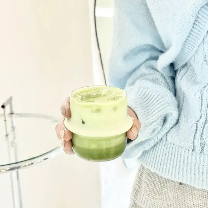 Modern borosilicate cap glass cup with layered green matcha iced drink and matching lid for kitchen use decorbites cap glass