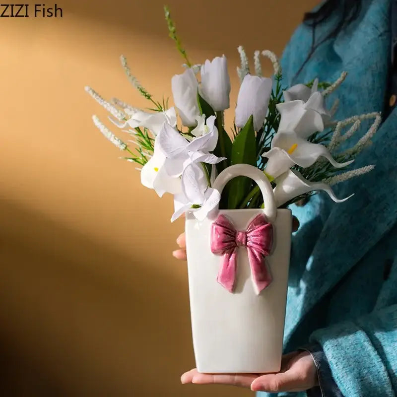 White ceramic vase handbag with pink bow and handle for living room decorbites bowknot ceramic vase decor