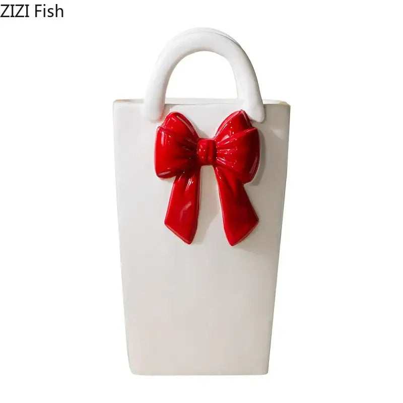 White ceramic ceramic vase handbag with glossy red bow and handle ideal for modern living room decorbites bowknot ceramic decor