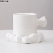 White ceramic decorbites bowknot decor porcelain cup with geometric handle and cloud-shaped base for dining room use