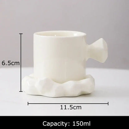 White ceramic decorbites bowknot decor porcelain cup with sculpted faceted handle and matching saucer for dining room use