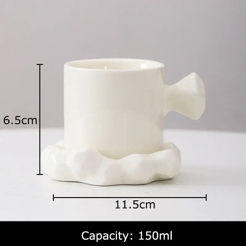 White ceramic decorbites bowknot decor porcelain cup with sculpted faceted handle and matching saucer for dining room use