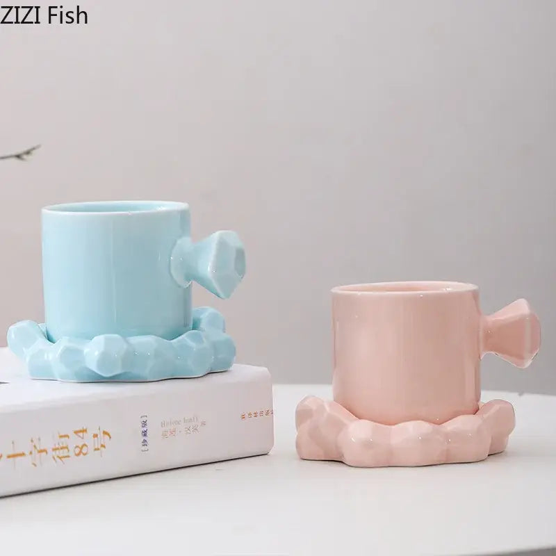 Modern bowknot decor porcelain cup set featuring pastel blue and pink mugs with faceted handles and cloud bases by decorbites bowknot decor
