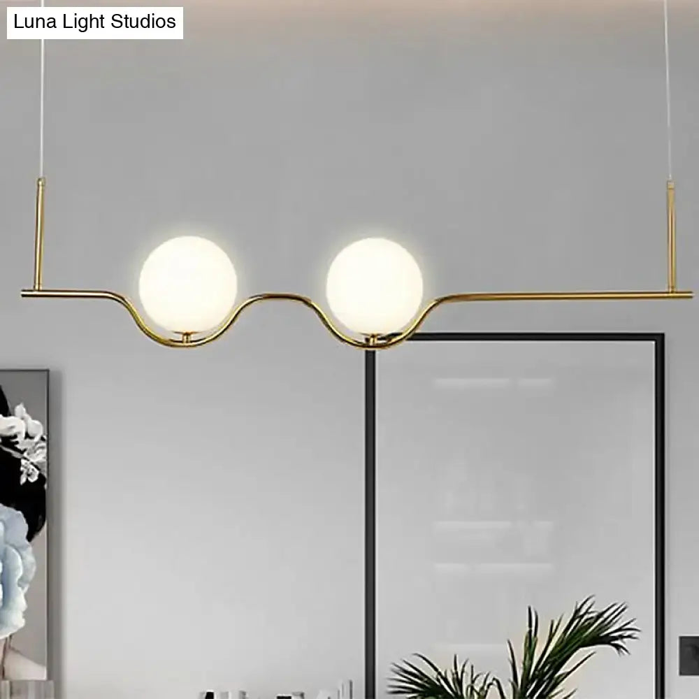 DecorBites modern brass 2-head pendant ceiling light with adjustable cord and white frosted glass shade spheres