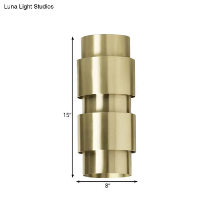 Modern brass 3 tier metal shade wall sconce with a geometric cylindrical design for foyer lighting
