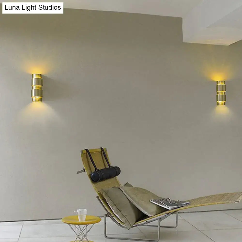 Modern brass 3 tier metal shade wall sconce with gold-toned cylindrical stacked segmented design for foyer lighting