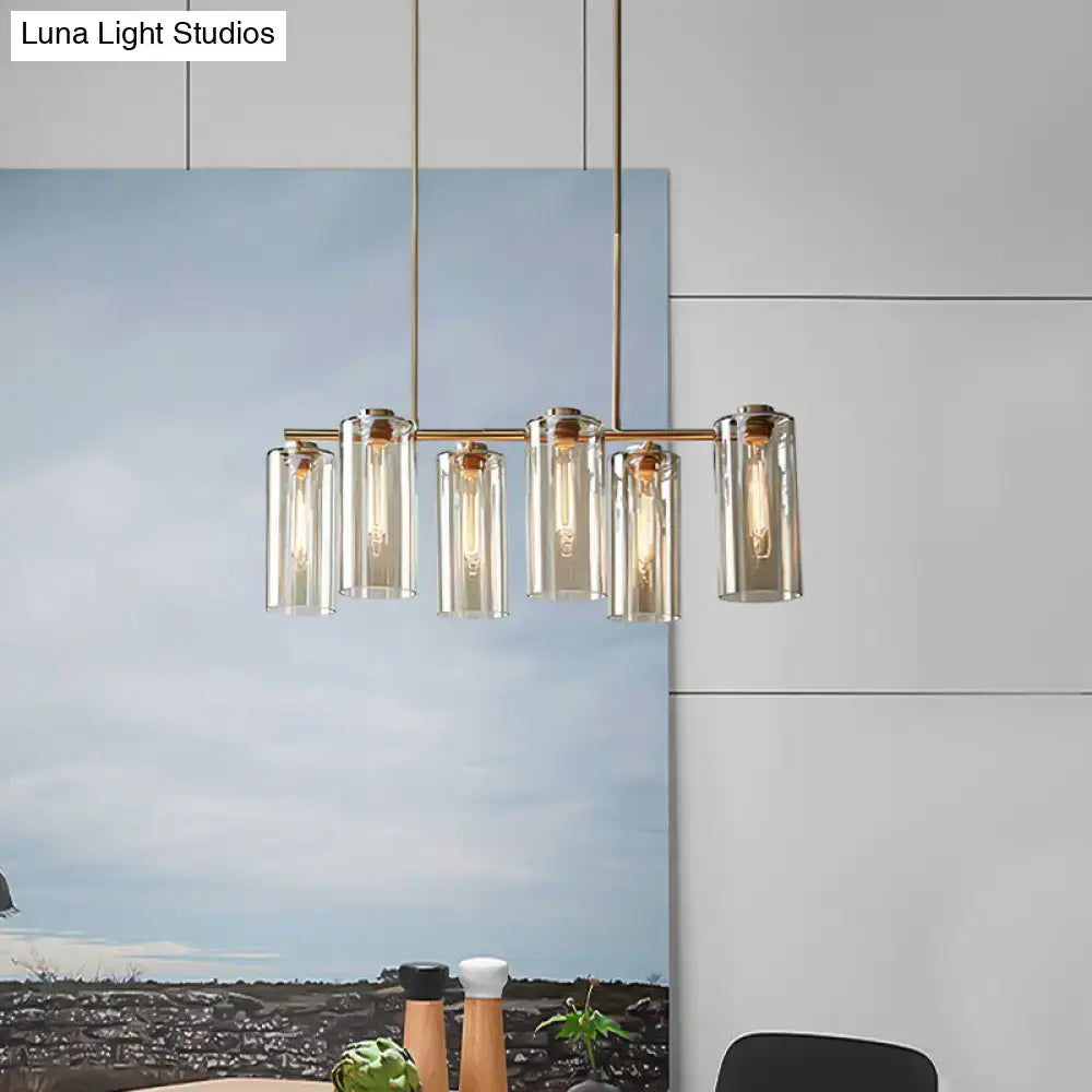 Modern brass 5 light chandelier with cognac glass shades and exposed bulbs for dining room island or room island light