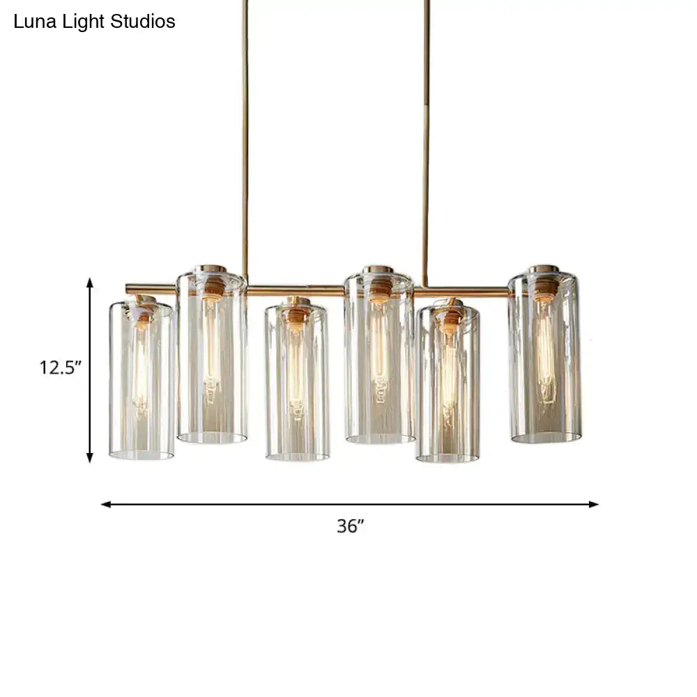 Modern brass 5 light chandelier with cognac glass shades and exposed bulbs ideal for dining room island light