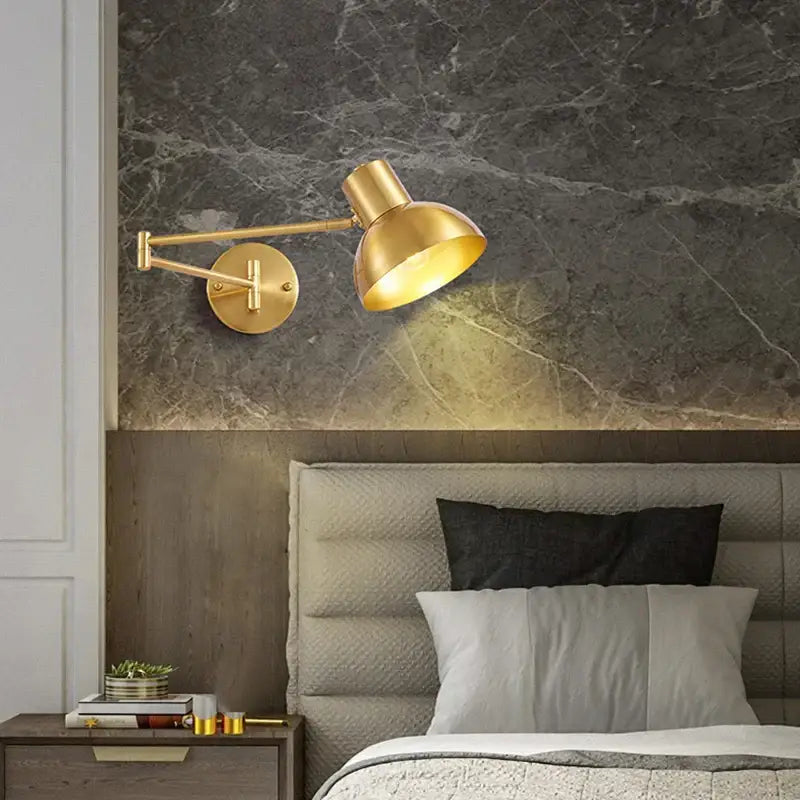 Modern brass adjustable e27 led wall lamp with gold finish, sleek arm, and dome shade for bedroom reading light decorbites