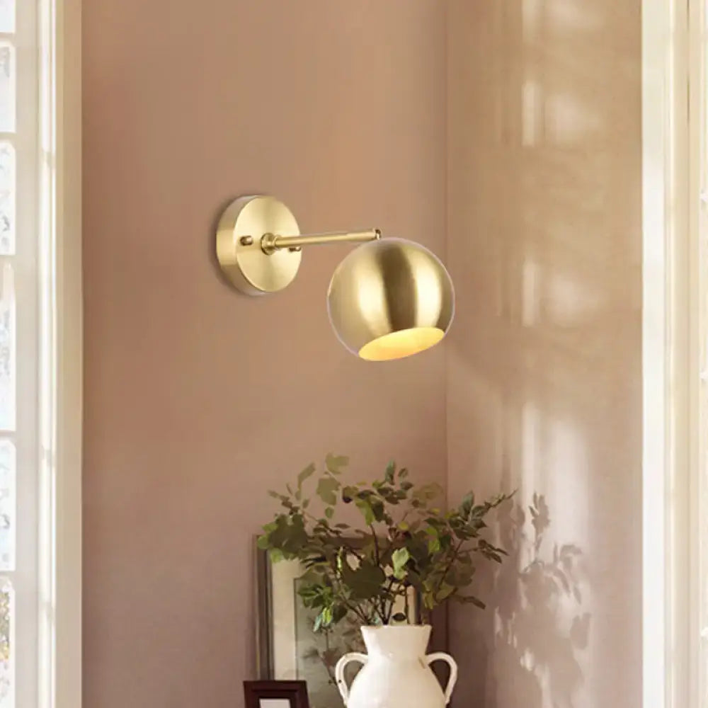 Modern brass adjustable spherical wall spotlight with a brass finish for dining room 110v-120v and 220v-240v use