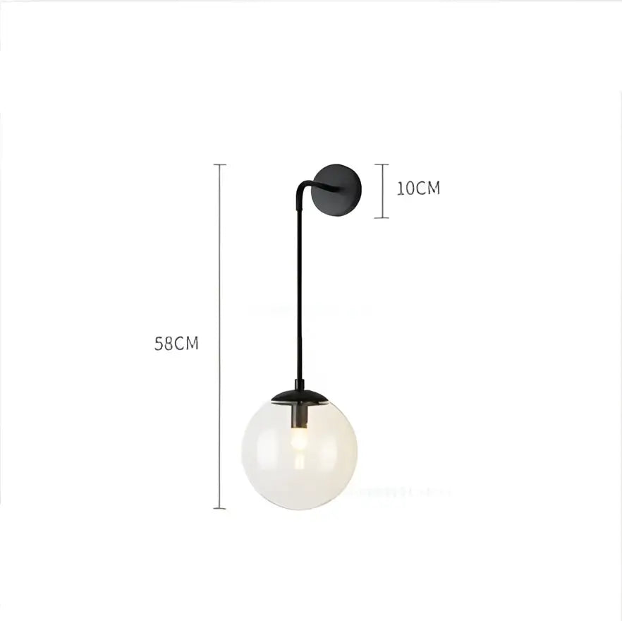 Black metal wall lamp with frosted glass globe inspired by decorbites glass ball wall lamps for modern bedroom decor
