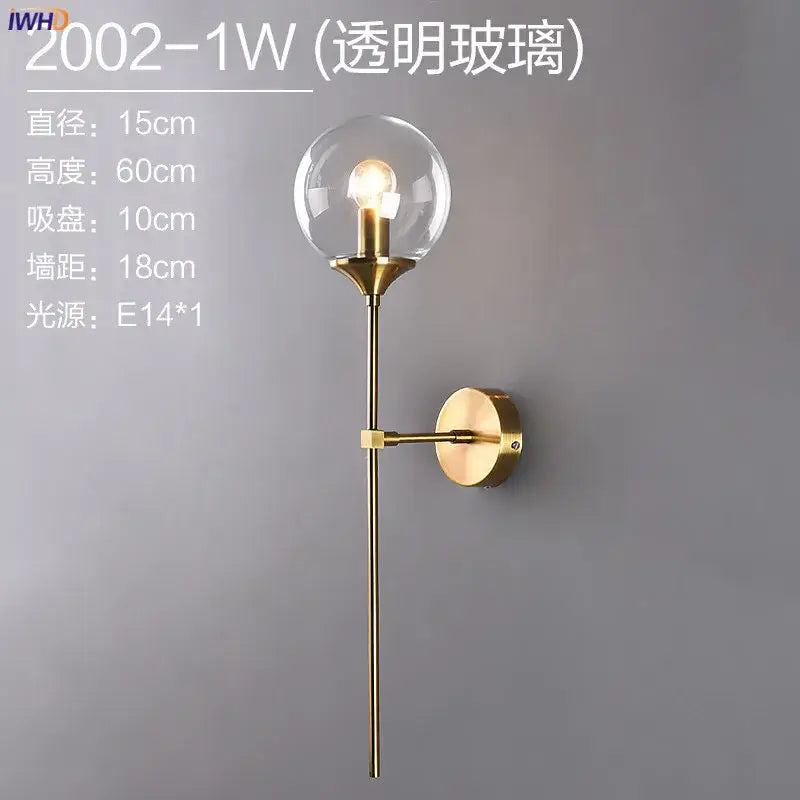 Modern brass and amber decorbites glass ball wall lamp with gold-toned metal and clear glass globe for bedroom wall lamp