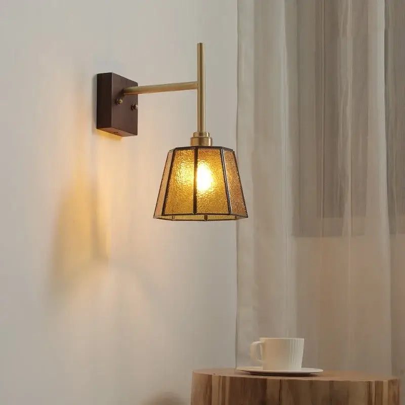 Modern brass wall lights featuring textured amber glass copper led shade ideal for bedroom sconce lighting
