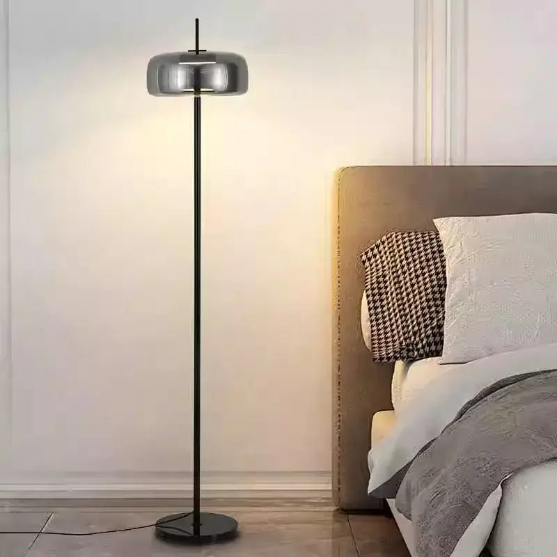 Modern floor lamp with sleek black metal pole and chrome dome shade for living room glass led floor lighting