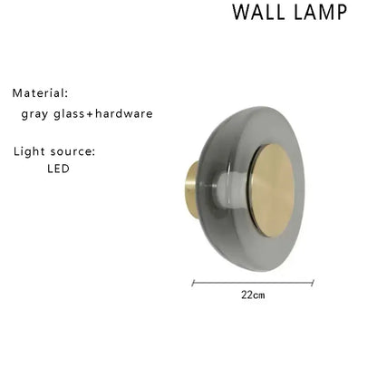 Modern gray glass led floor lamp with brass accent provides elegant living room lighting with energy-efficient LED source