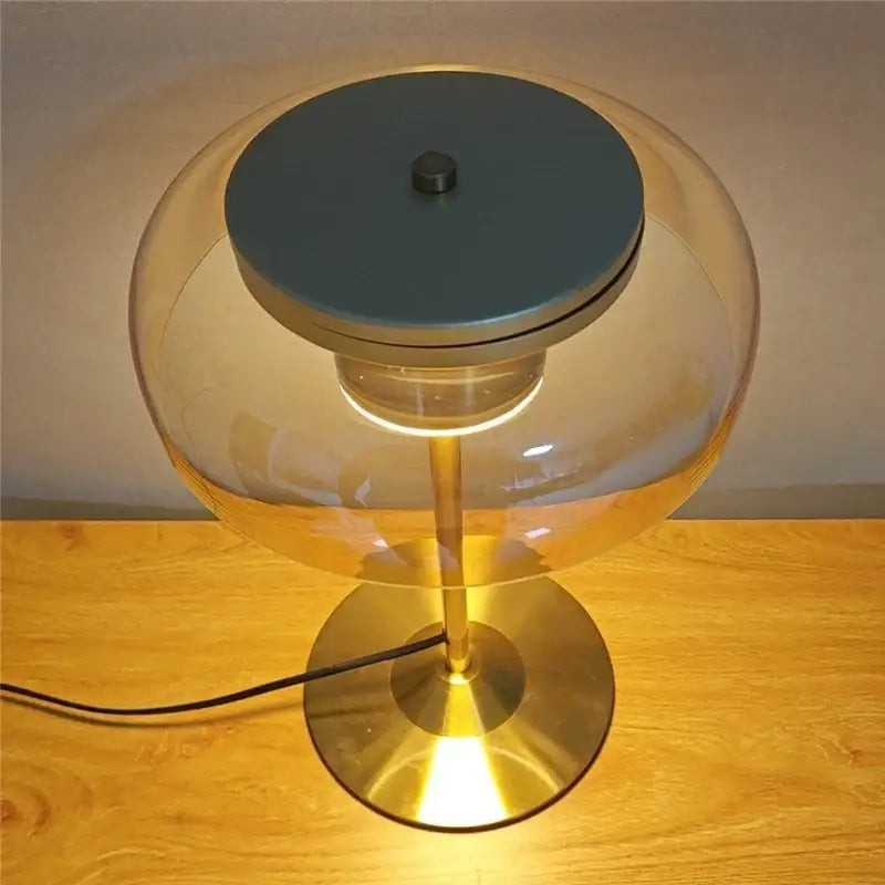 Modern brass and amber glass mushroom table lamp with translucent amber globe metallic gold base and teal shade for decorbites elegant mushroom decor