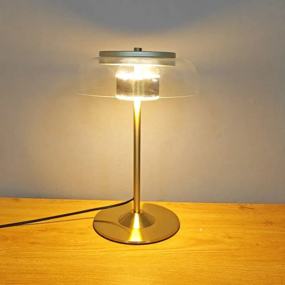 Modern brass and amber glass elegant mushroom table lamp with clear dome and warm light for bedroom decorbites elegant mushroom