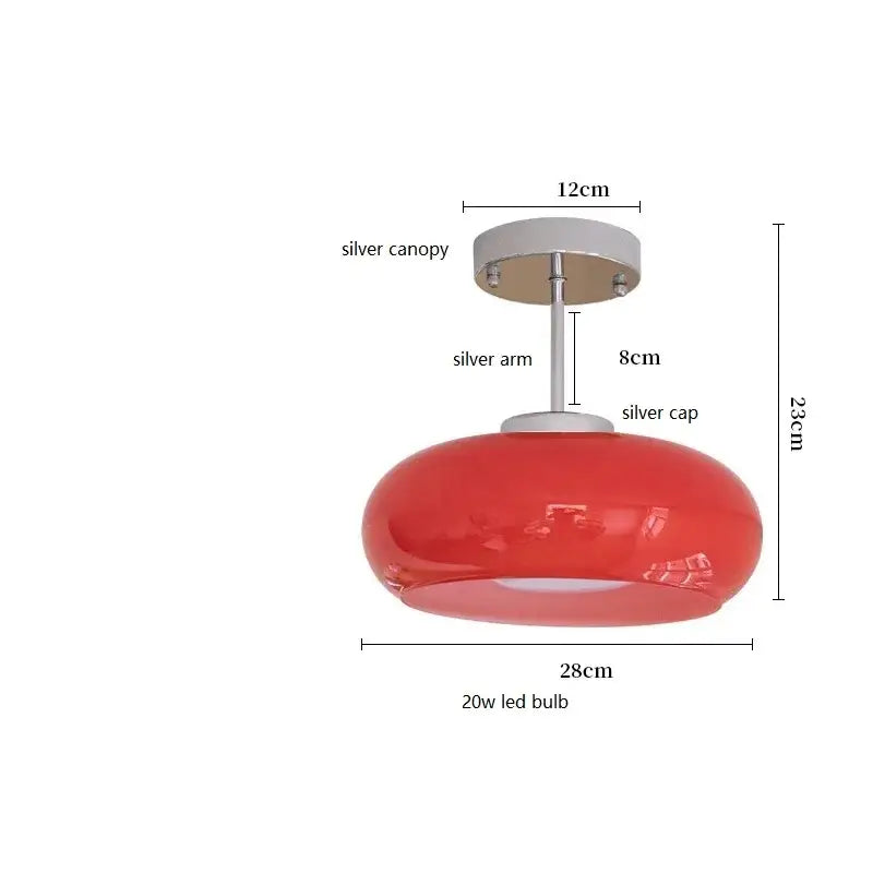 Modern brass and amber glass pendant light featuring vibrant red glossy glass and a sleek silver metal arm for kitchen decorbites copper bauhaus led lighting