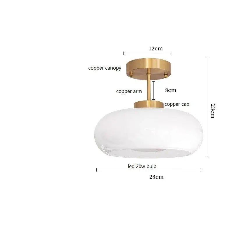 Modern brass and amber glass pendant light with brushed copper bauhaus led canopy and white glass globe for kitchen lighting