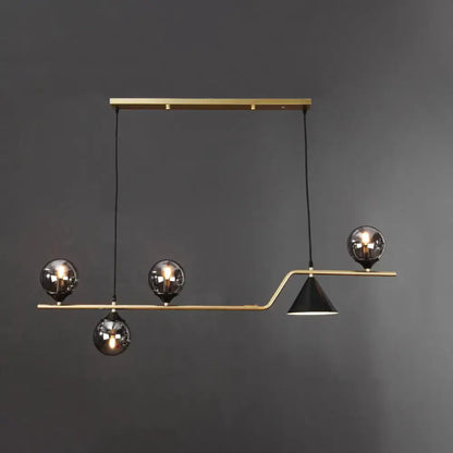 Modern brass DecorBites minimalist ball hanging island light with three smoked glass globes and black conical shade for dining room