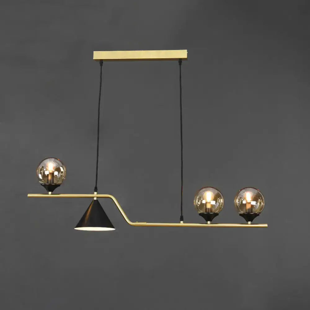 DecorBites™ minimalist gold metal ball hanging island pendant lamp with amber glass bulbs and black cone shade for dining room