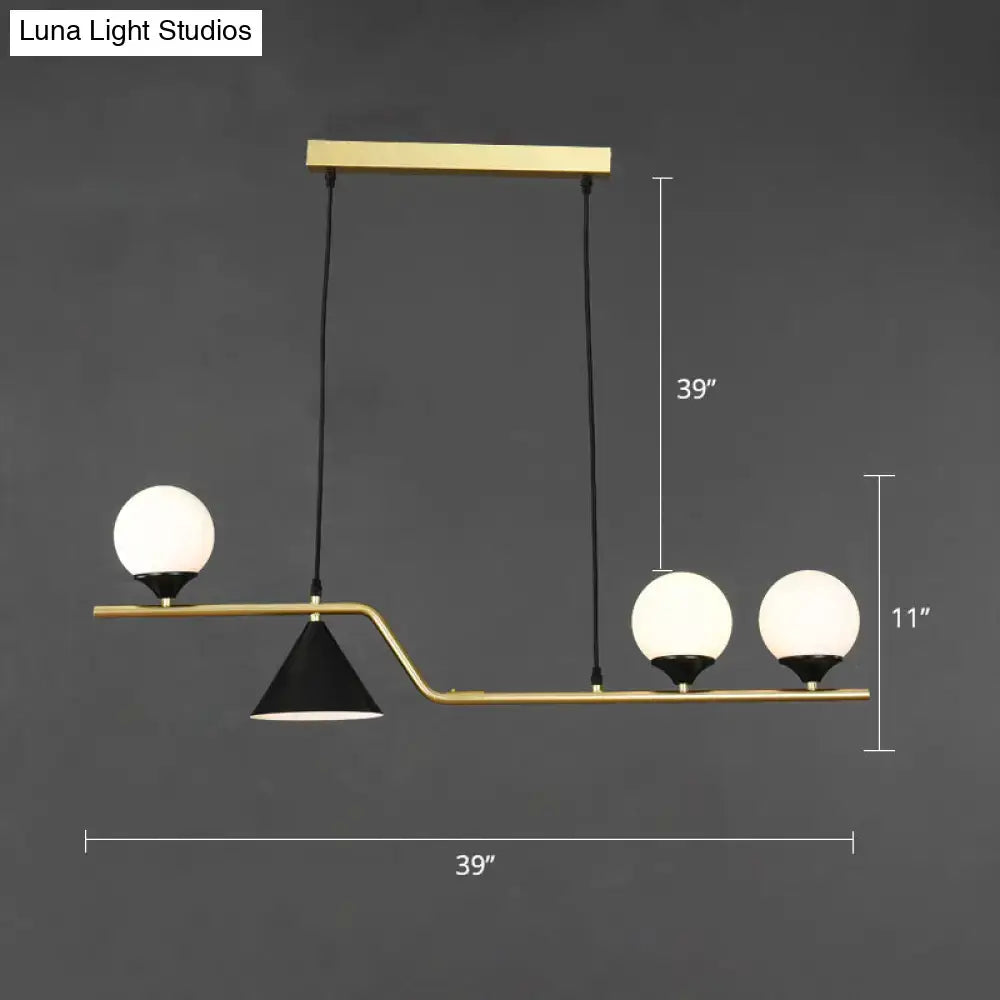 Modern brass and black hanging island light with three frosted glass globe shades by DecorBites™ for dining rooms