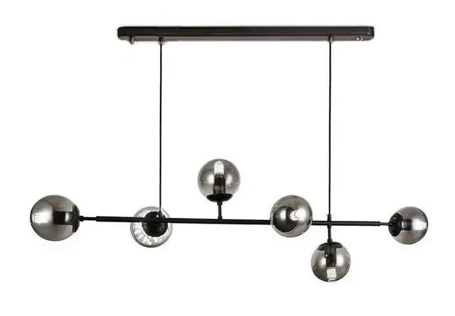 Modern brass and black art glass ball chandelier with black art glass globes in varying sizes for living room light