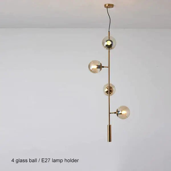 Modern brass and black art glass ball chandelier with four clear glass spheres and e27 bulbs for living room lighting