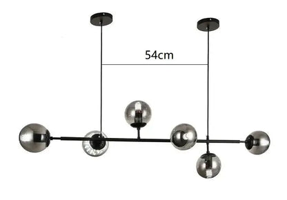 Modern brass and black metal chandelier with five smoked black art glass globe shades for living room lighting