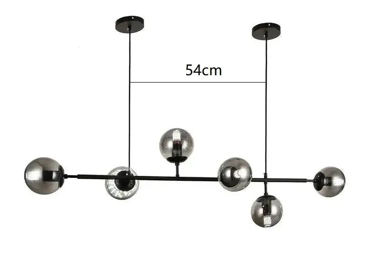 Modern brass and black metal chandelier with five smoked black art glass globe shades for living room lighting