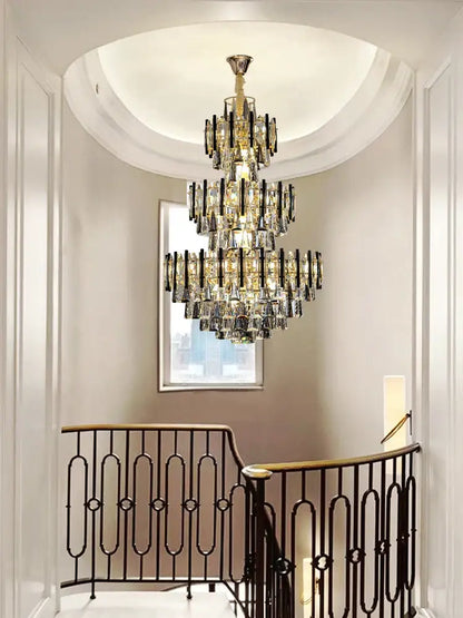 A modern brass and black crystal hollow villa chandelier with multi-tiered design hangs from a curved ceiling