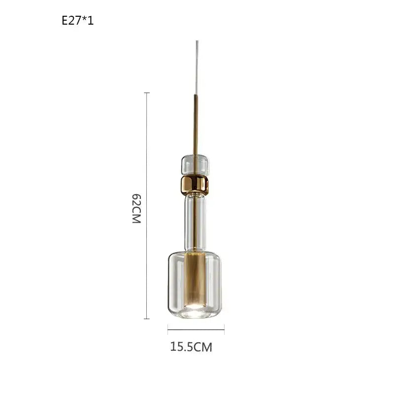 Modern brass and black cylindrical glass pendant light with gold-toned metal accent, 62cm height for kitchens decorbites cylindrical glass pendant