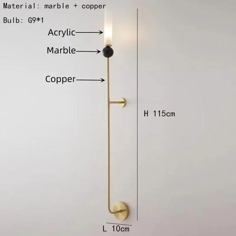 A modern decorbites foyer hallway lamp with slender copper frame, acrylic bulb, and dark marble accent sphere