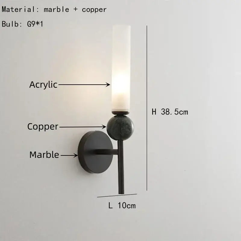A sleek decorbites foyer hallway lamp with dark marble base copper accents and acrylic diffuser wall-mounted sconce