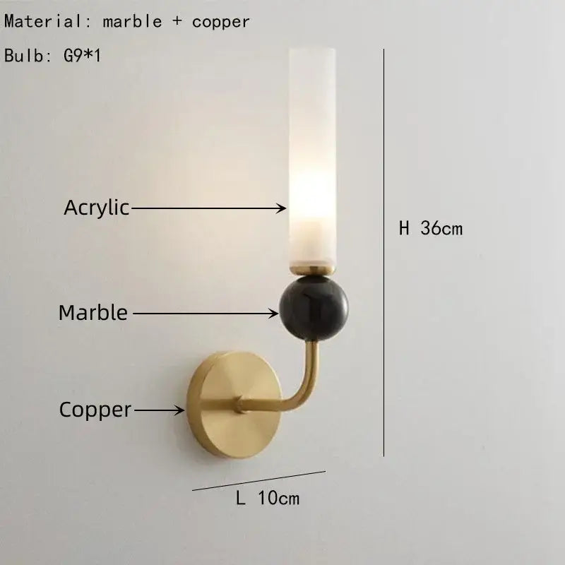 Modern brass and black decorbites foyer hallway lamp with a brass copper base, black marble sphere, and frosted glass shade