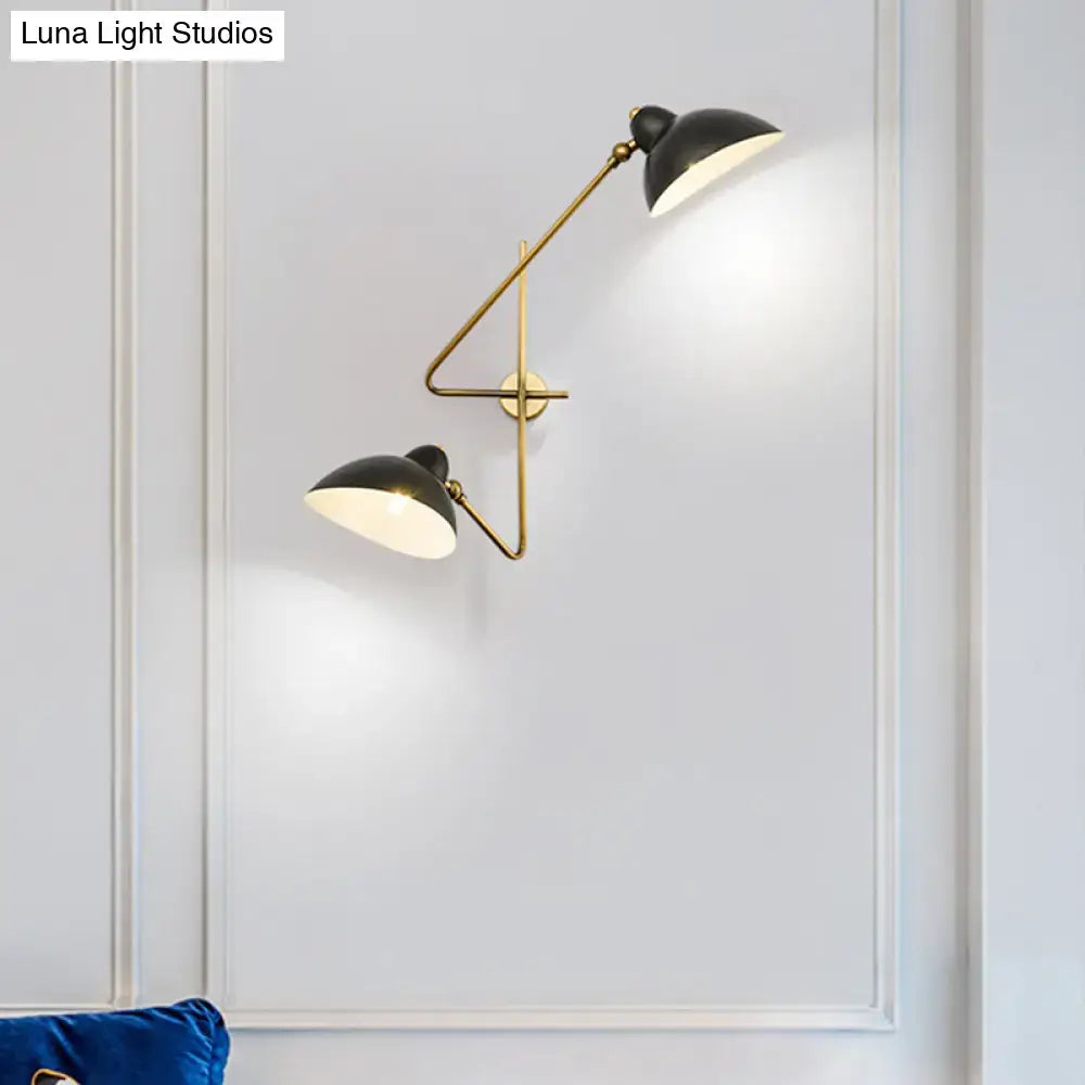 Modern brass and black duckbill wall sconce lamp with dual adjustable metal duckbill wall arms for living room lighting