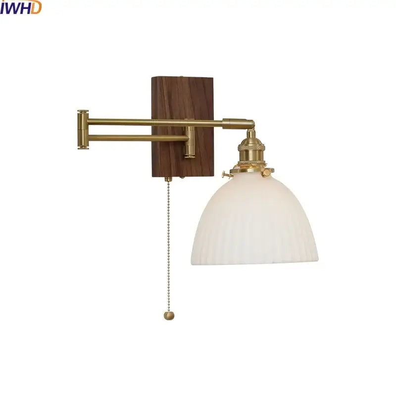 Modern brass and ceramic walnut led wall light with adjustable brass finish and dark wood backplate for living room decorbites ceramic walnut
